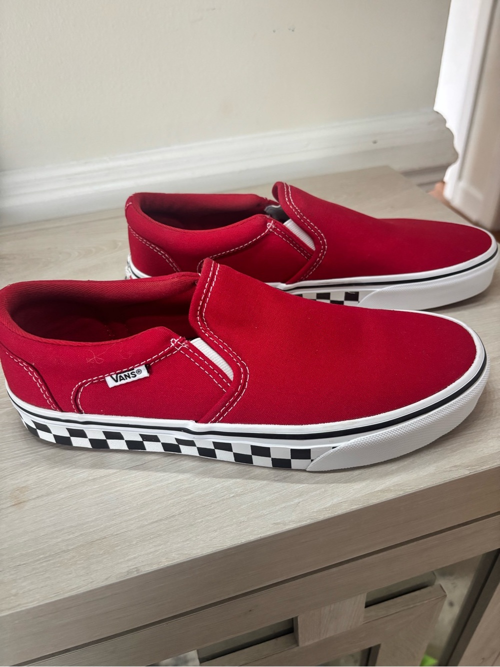 Vans Slip-On Canvas Sneakers in Red with Checkerboard Side